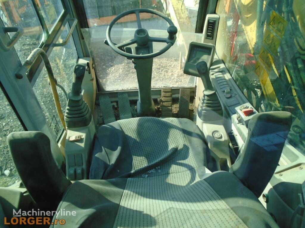 Ekskavator roda baru New Holland MH 5.6: gambar 6