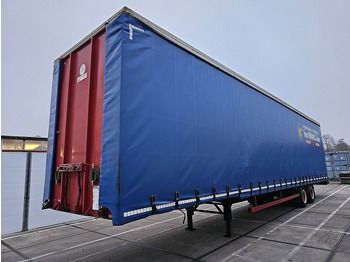 Semi-trailer dengan terpal samping