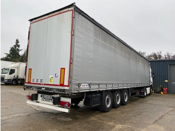 Semi-trailer dengan terpal samping SCHMITZ
