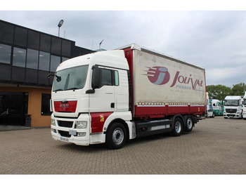 Truk dengan terpal samping MAN TGX 26.440