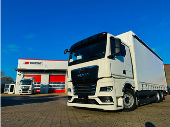 Truk dengan terpal samping MAN TGX 26.440