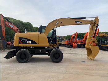 Ekskavator roda CATERPILLAR M315D