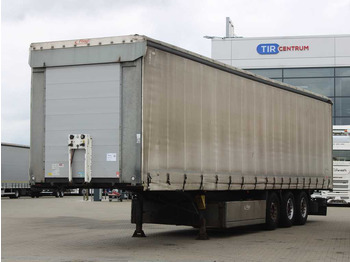 Semi-trailer dengan terpal samping FLIEGL