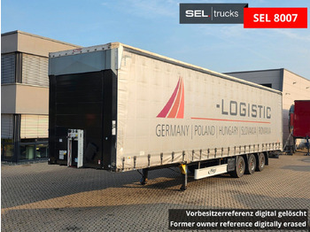 Semi-trailer dengan terpal samping FLIEGL