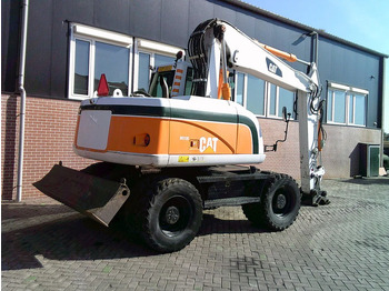 Ekskavator roda Caterpillar M313D: gambar 4