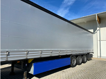 Semi-trailer dengan terpal samping SCHMITZ SCS