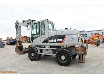 Ekskavator roda CAT M 313 D: gambar 2