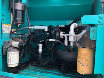 Ekskavator perayap Kobelco SK 210: gambar 5