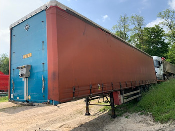 Semi-trailer dengan terpal samping SAMRO