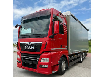 Truk dengan terpal samping MAN TGX 26.500