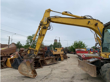 Ekskavator roda Komatsu PW 140-7: gambar 4 Ekskavator roda Komatsu PW 140-7: gambar 4