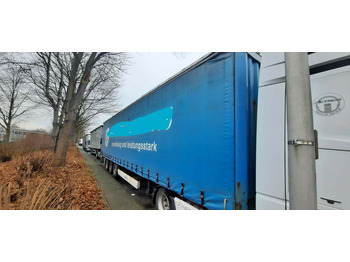 Semi-trailer dengan terpal samping KRONE