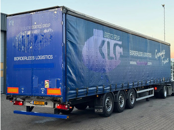 Semi-trailer dengan terpal samping TRACON