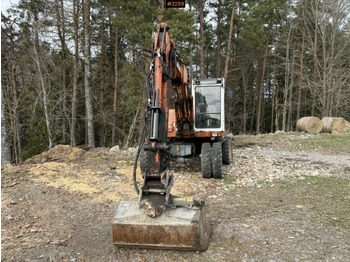 Ekskavator roda Wheeled excavator Atlas 1004 with attachments: gambar 5