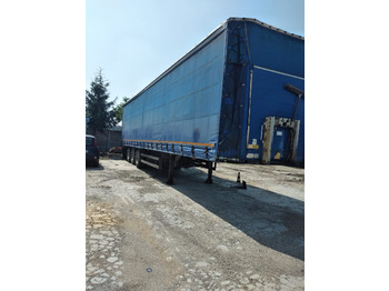 Semi-trailer dengan terpal samping