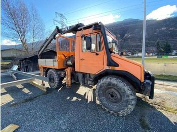 Truk jungkit UNIMOG