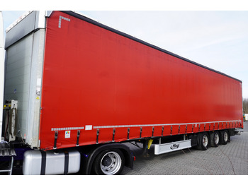 Semi-trailer dengan terpal samping FLIEGL