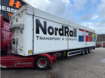 Semi-trailer dengan lantai berjalan KRAKER