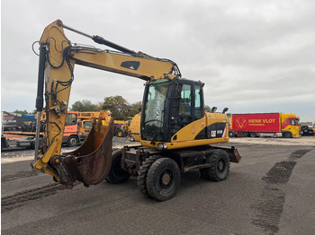 Ekskavator roda CATERPILLAR M313D