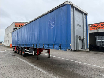 Semi-trailer dengan terpal samping AMT