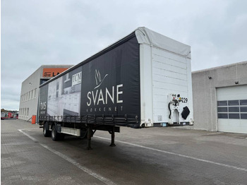 Semi-trailer dengan terpal samping FLIEGL