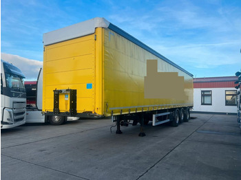 Semi-trailer dengan terpal samping