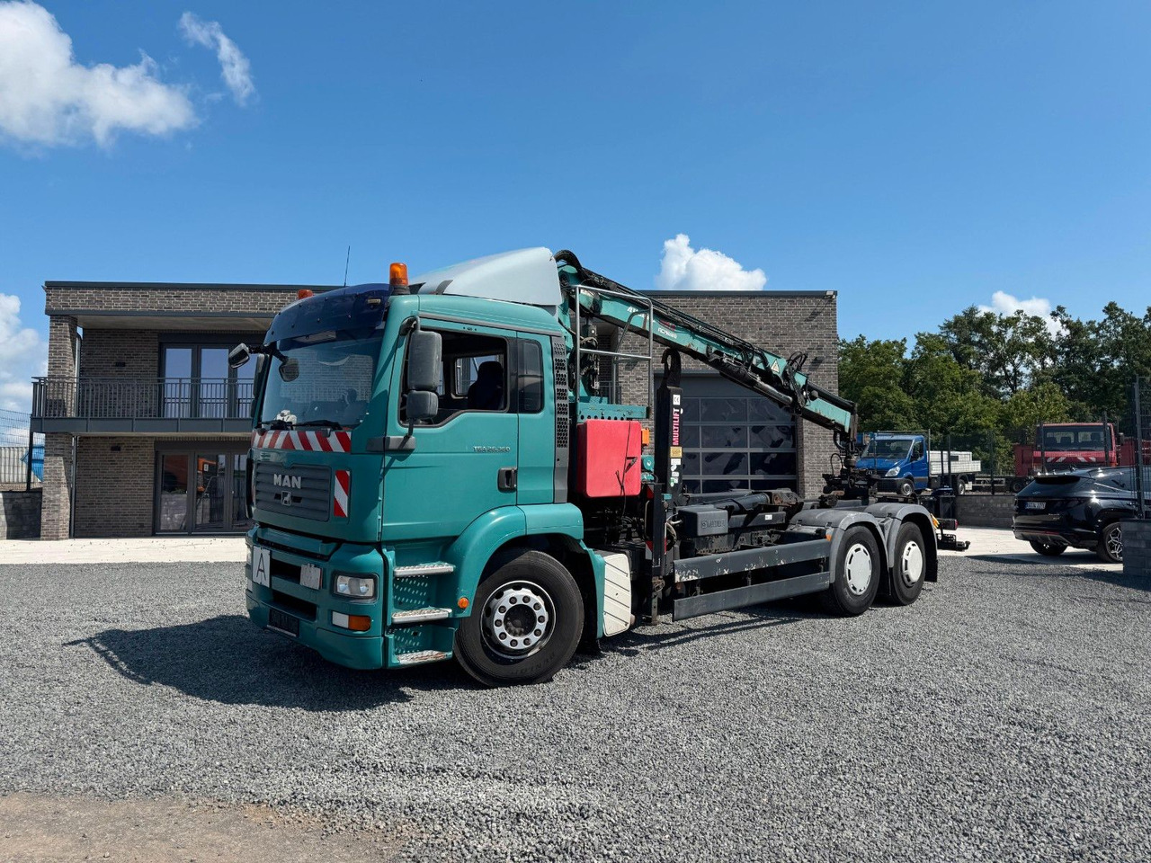 MAN TGA 26.360 Kran TeRex Multilift Fernbedienung - Hook lift, Truk derek: gambar 2 MAN TGA 26.360 Kran TeRex Multilift Fernbedienung - Hook lift, Truk derek: gambar 2