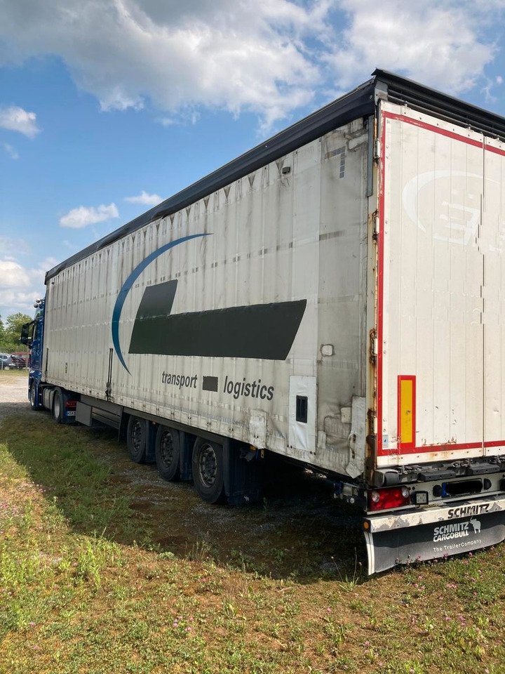 Schmitz Cargobull Auflieger Pritsche + Plane - Semi-trailer dengan terpal samping: gambar 2 Schmitz Cargobull Auflieger Pritsche + Plane - Semi-trailer dengan terpal samping: gambar 2