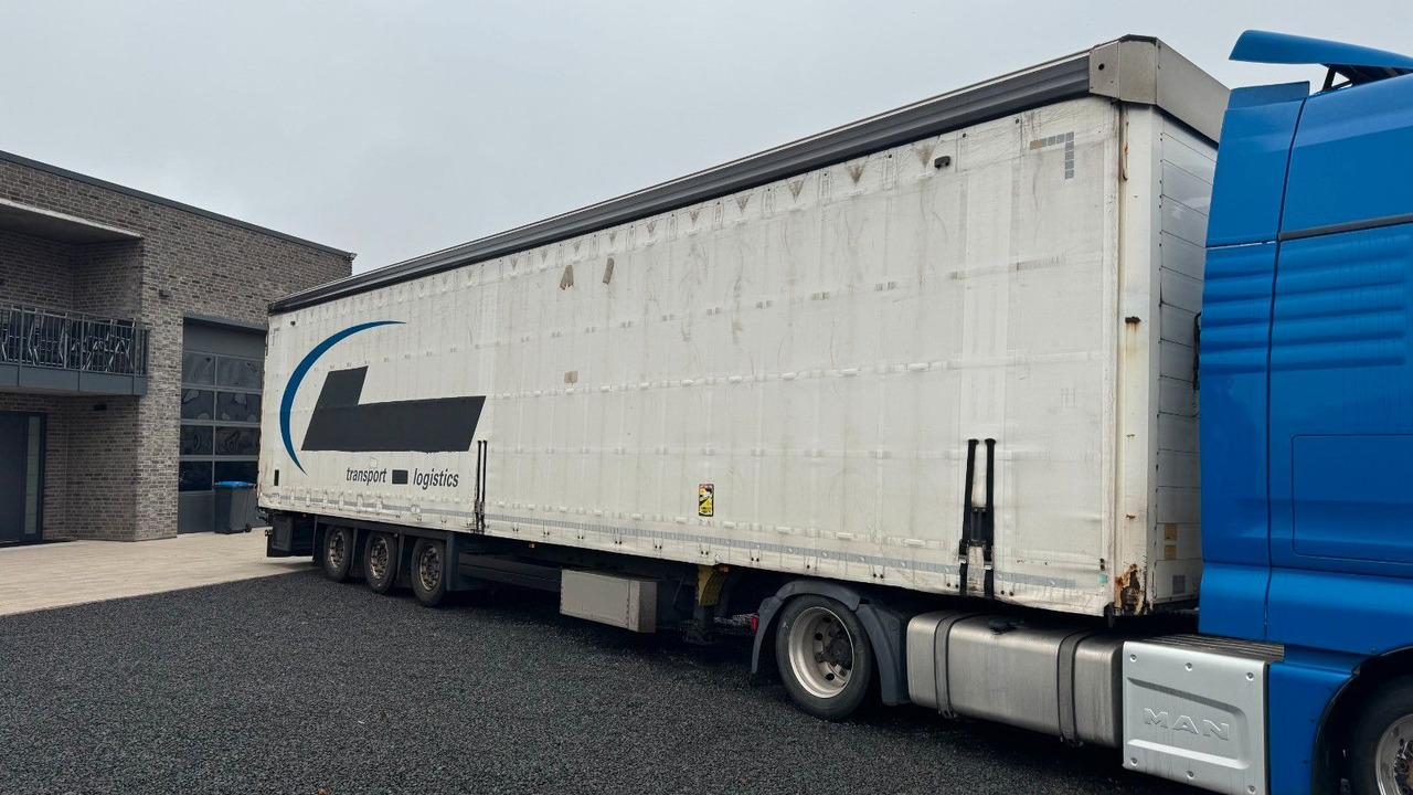 Schmitz Cargobull Auflieger Pritsche + Plane Speed Curtain - Semi-trailer dengan terpal samping: gambar 4 Schmitz Cargobull Auflieger Pritsche + Plane Speed Curtain - Semi-trailer dengan terpal samping: gambar 4
