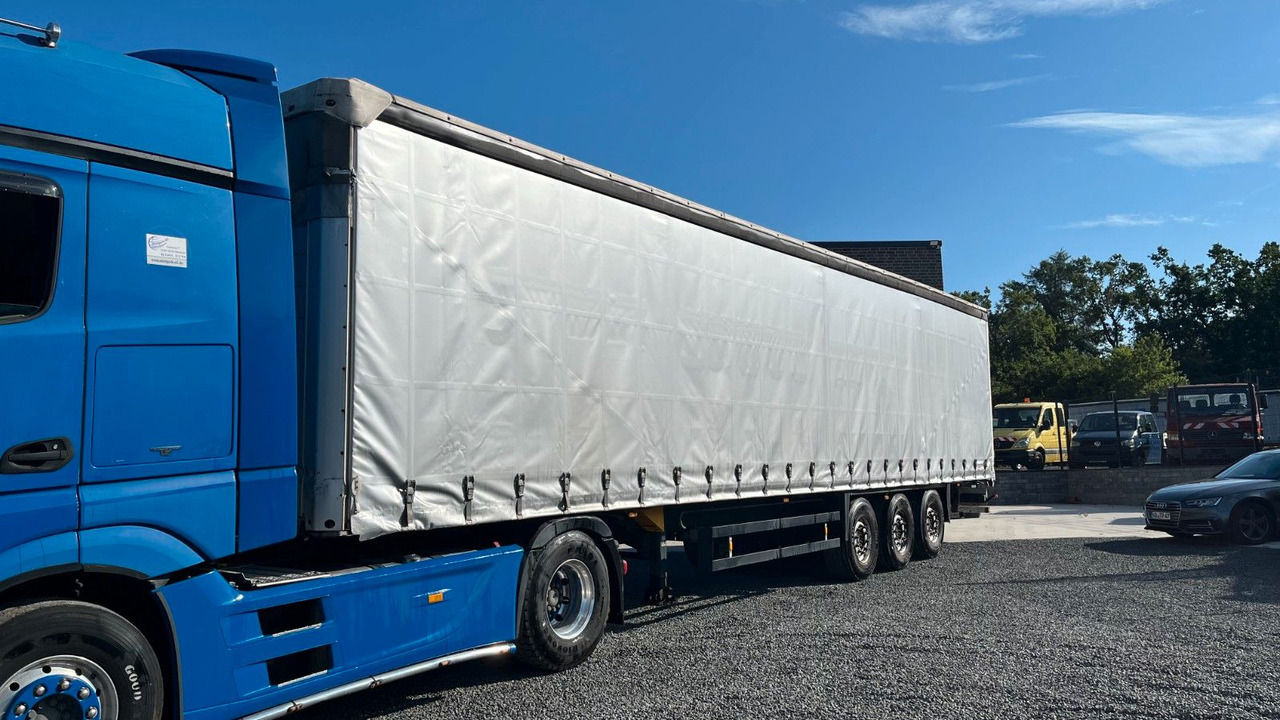 Schmitz Cargobull S01 Pritsche Plane Edscha Liftachse - Semi-trailer dengan terpal samping: gambar 2 Schmitz Cargobull S01 Pritsche Plane Edscha Liftachse - Semi-trailer dengan terpal samping: gambar 2