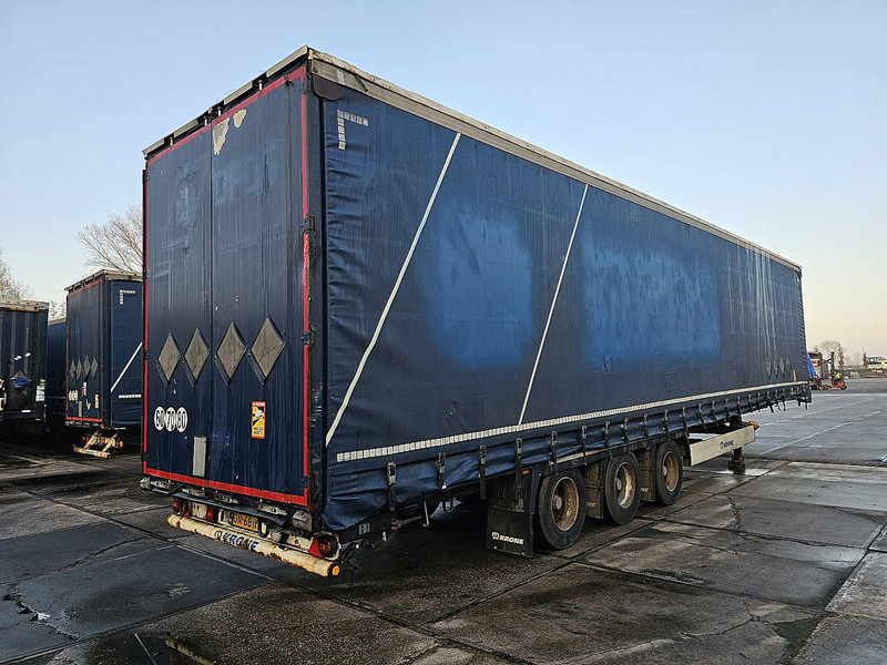 Krone N/A - Semi-trailer dengan terpal samping: gambar 2 Krone N/A - Semi-trailer dengan terpal samping: gambar 2