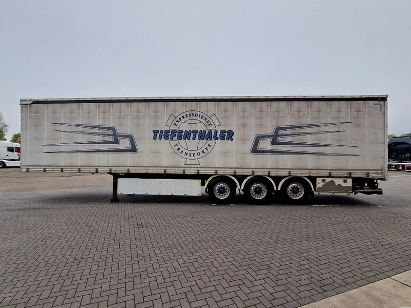 Schwarzmüller Tautliner 3 axle - Loadlift - Lift axle - BPW Axle - Lift axle - Alloy wheels - Semi-trailer dengan terpal samping: gambar 4 Schwarzmüller Tautliner 3 axle - Loadlift - Lift axle - BPW Axle - Lift axle - Alloy wheels - Semi-trailer dengan terpal samping: gambar 4