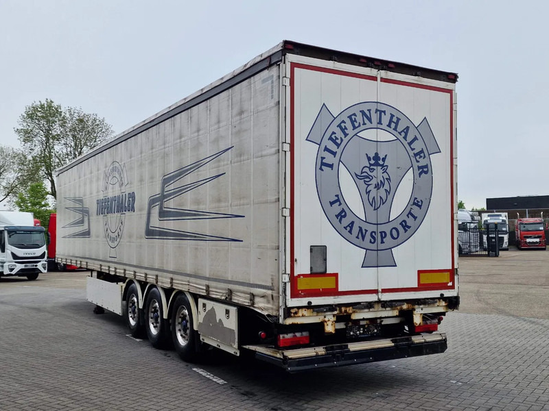 Schwarzmüller Tautliner 3 axle - Loadlift - Lift axle - BPW Axle - Lift axle - Alloy wheels - Semi-trailer dengan terpal samping: gambar 5 Schwarzmüller Tautliner 3 axle - Loadlift - Lift axle - BPW Axle - Lift axle - Alloy wheels - Semi-trailer dengan terpal samping: gambar 5