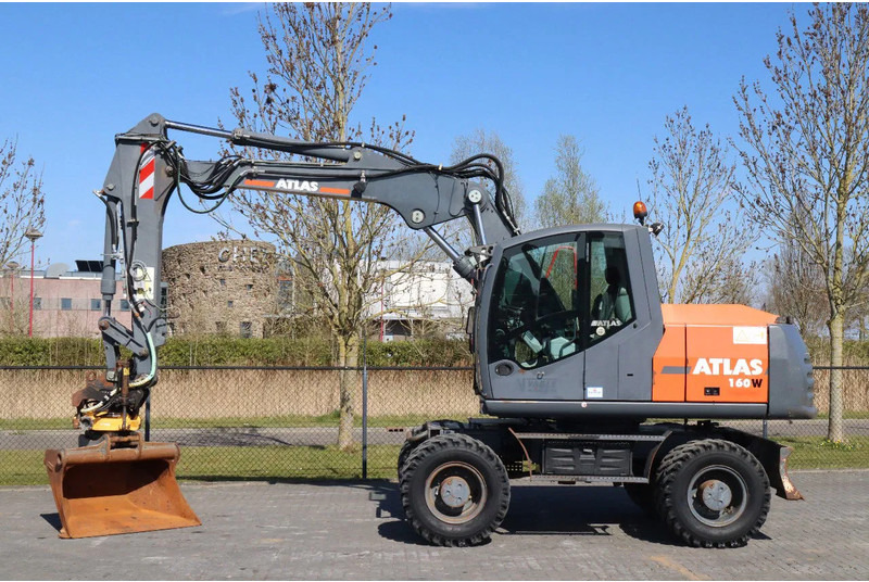 Atlas 160W | ENGCON | BUCKET | DOZERBLADE | 2-PIECE BOOM - Ekskavator roda: gambar 1 Atlas 160W | ENGCON | BUCKET | DOZERBLADE | 2-PIECE BOOM - Ekskavator roda: gambar 1