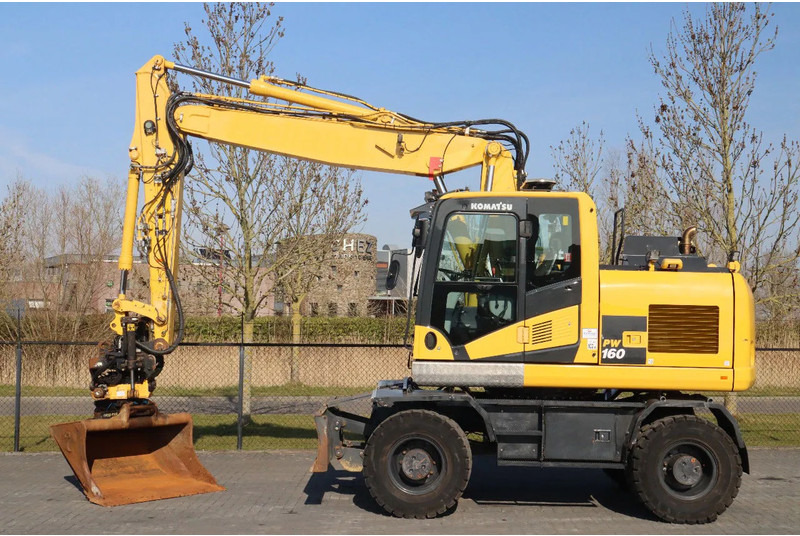 Komatsu PW160-11 | ENGCON TILTROTATOR | BUCKET | TRAILER HYDR. - Ekskavator roda: gambar 1 Komatsu PW160-11 | ENGCON TILTROTATOR | BUCKET | TRAILER HYDR. - Ekskavator roda: gambar 1