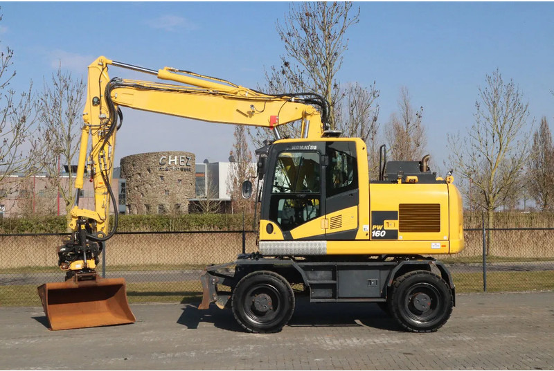 Komatsu PW160-11 | ENGCON TILTROTATOR | BUCKET | TRAILER HYDR. - Ekskavator roda: gambar 1 Komatsu PW160-11 | ENGCON TILTROTATOR | BUCKET | TRAILER HYDR. - Ekskavator roda: gambar 1