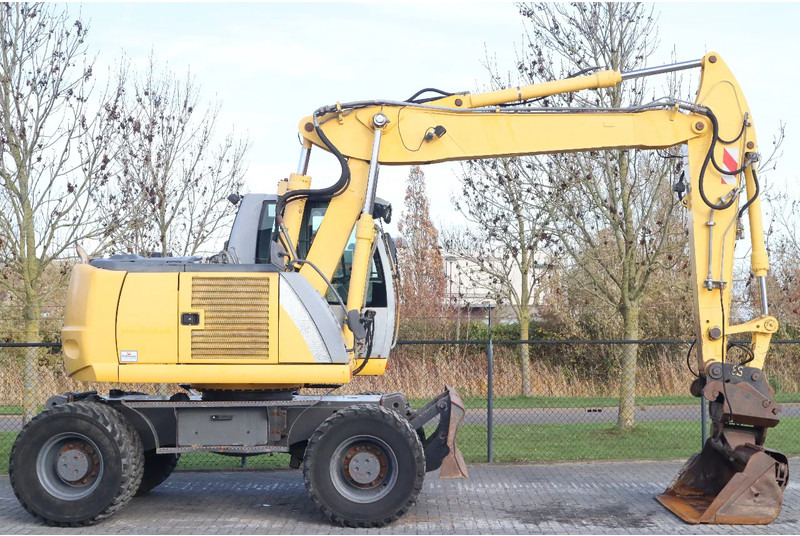 New Holland MH CITY | TILT BUCKET | QUICK COUPLER | DOZER BLADE - Ekskavator roda: gambar 4 New Holland MH CITY | TILT BUCKET | QUICK COUPLER | DOZER BLADE - Ekskavator roda: gambar 4