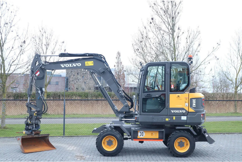 Volvo EW60E | DEMO | 30 KM/H | ROTOTILT + GRIPPER | BUCKET - Ekskavator roda: gambar 1 Volvo EW60E | DEMO | 30 KM/H | ROTOTILT + GRIPPER | BUCKET - Ekskavator roda: gambar 1