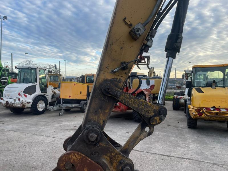 Caterpillar M316 - Ekskavator roda: gambar 3 Caterpillar M316 - Ekskavator roda: gambar 3