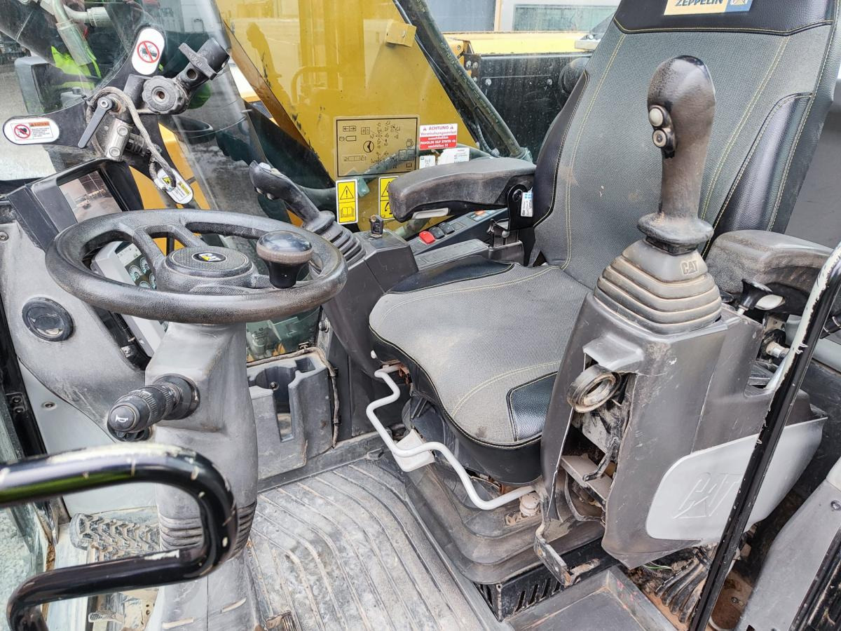 Caterpillar M318F - Ekskavator roda: gambar 4 Caterpillar M318F - Ekskavator roda: gambar 4