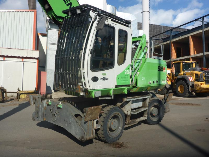 Sennebogen 818 - Mesin pengisi: gambar 5 Sennebogen 818 - Mesin pengisi: gambar 5