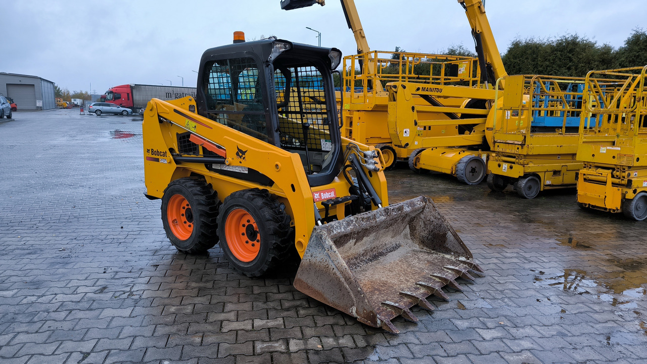 BOBCAT S450 - Skid steer: gambar 1 BOBCAT S450 - Skid steer: gambar 1