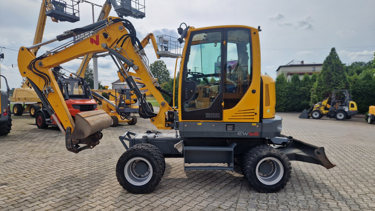 WACKER NEUSON EW65 - Ekskavator roda: gambar 1 WACKER NEUSON EW65 - Ekskavator roda: gambar 1