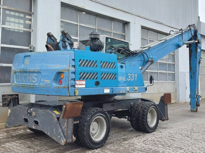 Mesin pengisi Fuchs MHL 331 D: gambar 6 Mesin pengisi Fuchs MHL 331 D: gambar 6