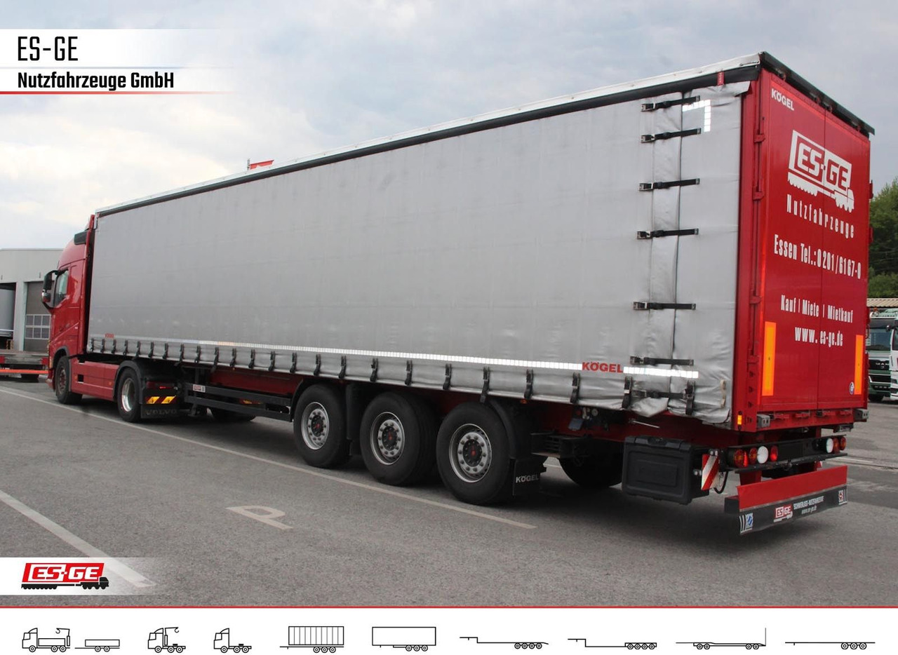 Kögel 3-Achs-Cargo-Coil-Pritschensattelanhänger Kögel 3-Achs-Cargo-Coil-Pritschensattelanhänger - Semi-trailer dengan terpal samping: gambar 1 Kögel 3-Achs-Cargo-Coil-Pritschensattelanhänger Kögel 3-Achs-Cargo-Coil-Pritschensattelanhänger - Semi-trailer dengan terpal samping: gambar 1