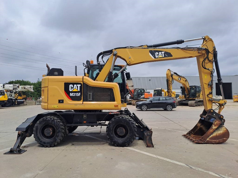 Cat M 315 F - Ekskavator roda: gambar 5 Cat M 315 F - Ekskavator roda: gambar 5