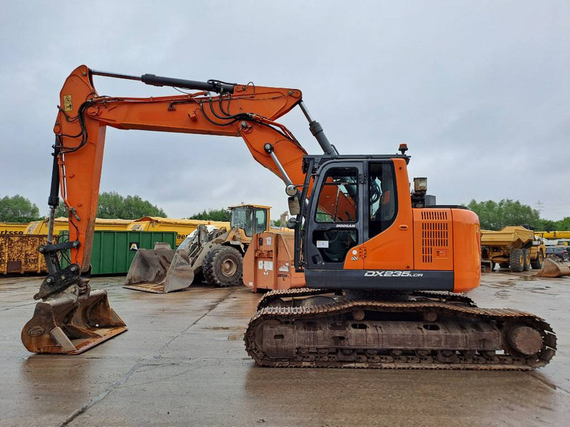 Doosan DX235LCR-5 (+ 3 Buckets) - Ekskavator perayap: gambar 1 Doosan DX235LCR-5 (+ 3 Buckets) - Ekskavator perayap: gambar 1