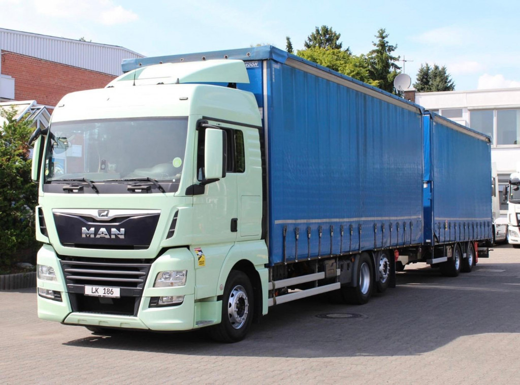 MAN TGX 26.460 Retarder Jumbo-Zug 120M3 Durchlade - Truk dengan terpal samping: gambar 1 MAN TGX 26.460 Retarder Jumbo-Zug 120M3 Durchlade - Truk dengan terpal samping: gambar 1