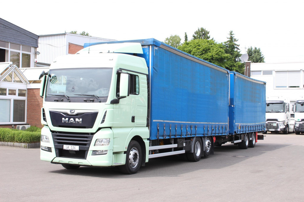 MAN TGX26.460 Durchlad Plane-Jumbo Retarder Hubdach - Truk dengan terpal samping: gambar 1 MAN TGX26.460 Durchlad Plane-Jumbo Retarder Hubdach - Truk dengan terpal samping: gambar 1
