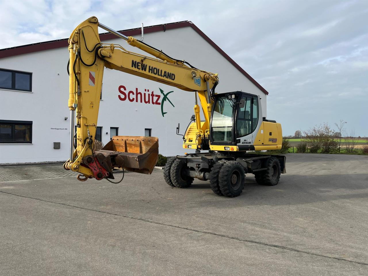 New Holland MH 5.6 inkl. Grabenlöffel, Tieflöffel - Ekskavator roda: gambar 1 New Holland MH 5.6 inkl. Grabenlöffel, Tieflöffel - Ekskavator roda: gambar 1